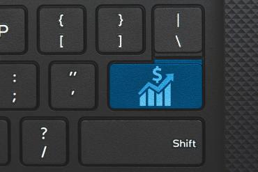 Money icon on computer keyboard.